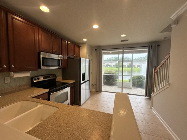 Stunning Townhome With Pond View In Gated Community property image